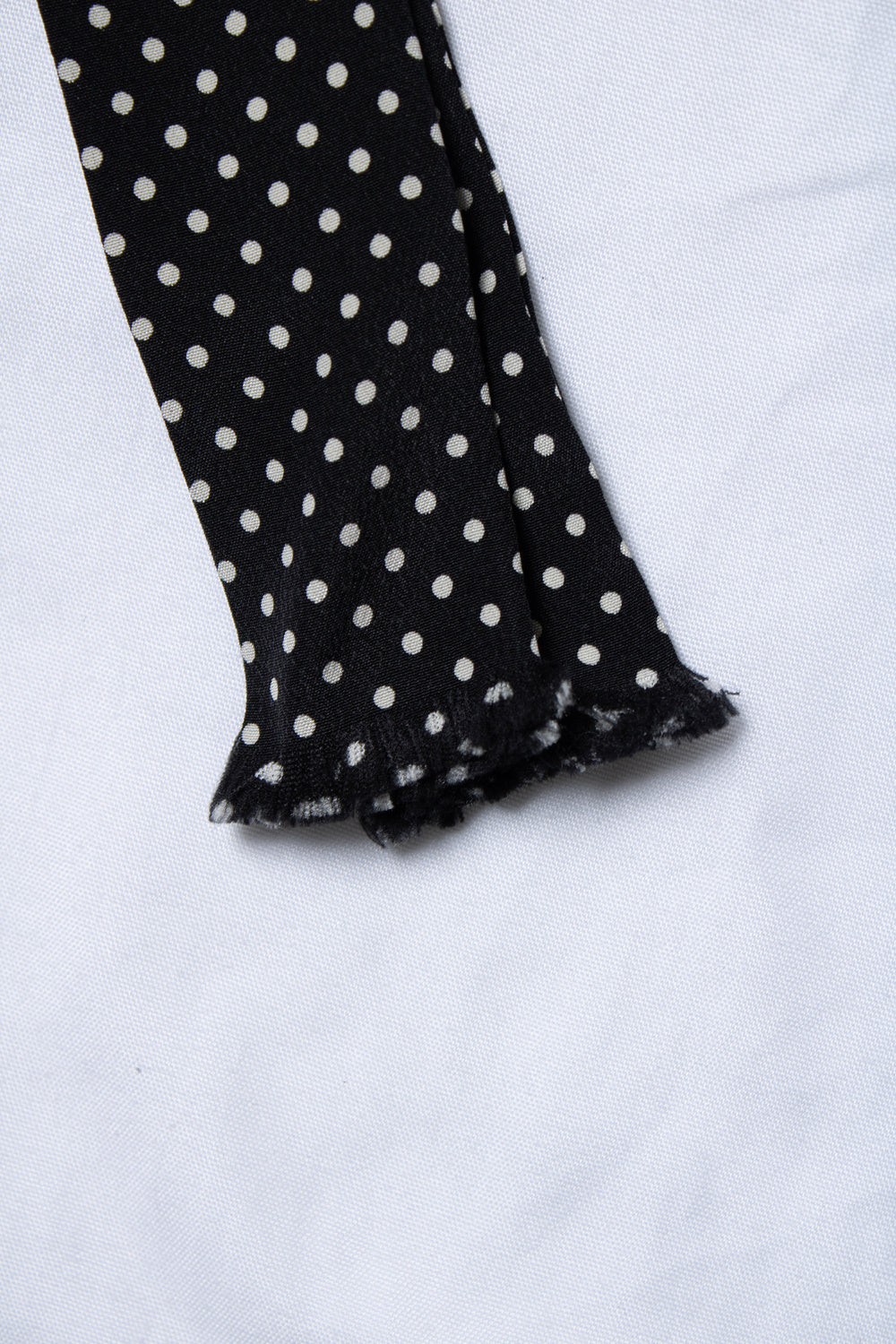 Saint Laurent, skinny black dotted silk scarf