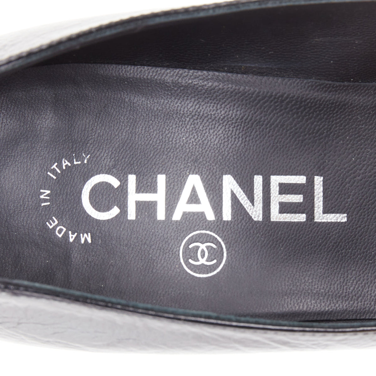 Women's Chanel Sculpted Sailor Knot black leather CC cap toe pumps