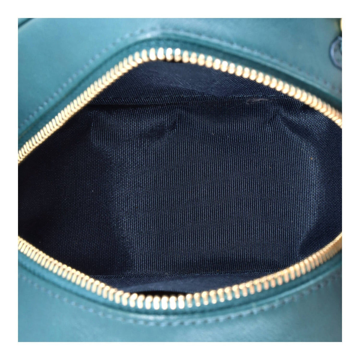 19 Round Clutch with Chain Quilted Leather