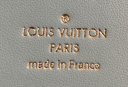 Capucines Vertical Wallet Leather