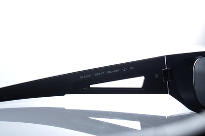 Prada, matte black sunglasses with red logo