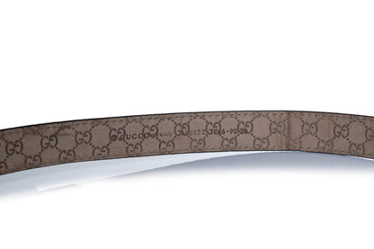 Gucci, python leather belt with gold metal bow
