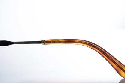 Gucci, transparent and gold aviator