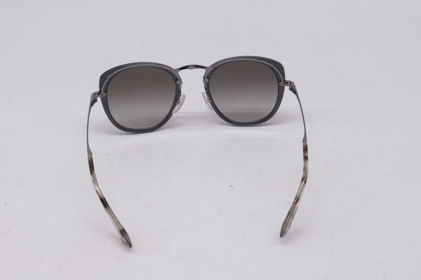 Prada Catwalk SPR58U Oval Sunglasses in Grey Metal