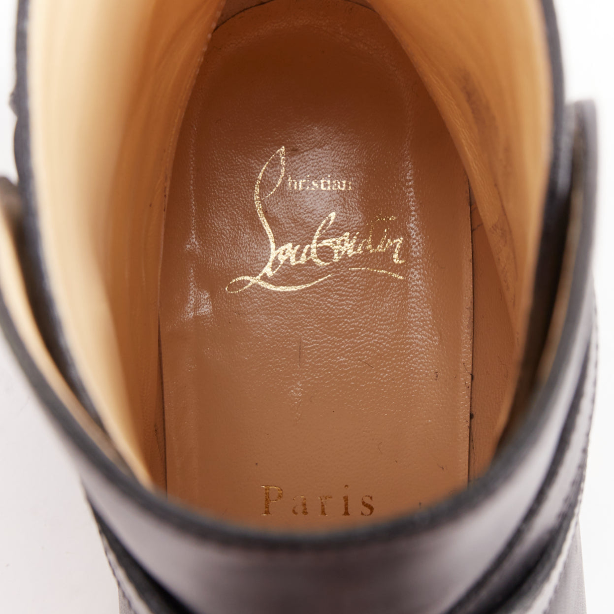 Women's Christian Louboutin Leather Buckle Boots