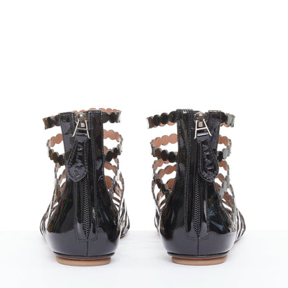 Women's Alaia Patent Scalloped Cage Sandals