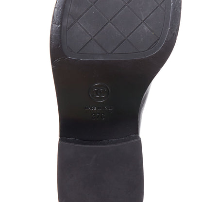 Women's Chanel Leather Gold Logo Loafers