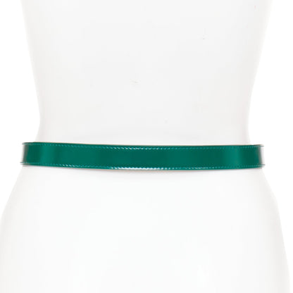 Alaia leather silver swirl loop hook skinny belt