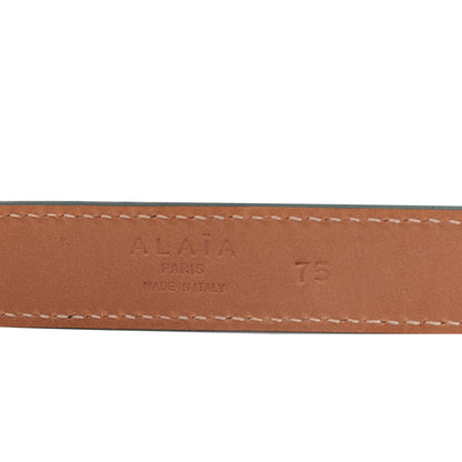 Alaia leather silver swirl loop hook skinny belt