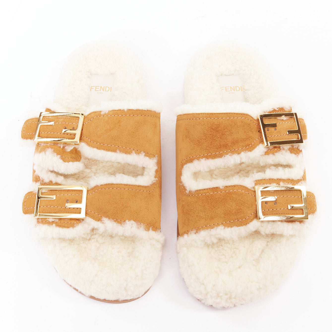 Women's Fendi Feel suede shearling gold FF buckle sandal slides