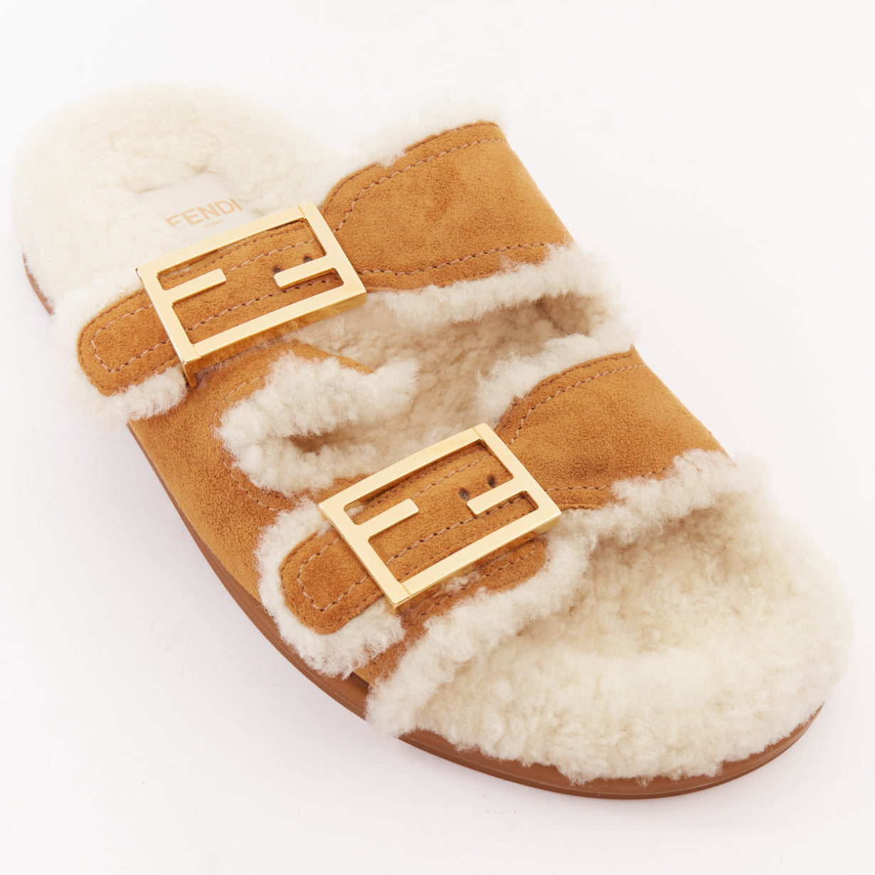 Women's Fendi Feel suede shearling gold FF buckle sandal slides