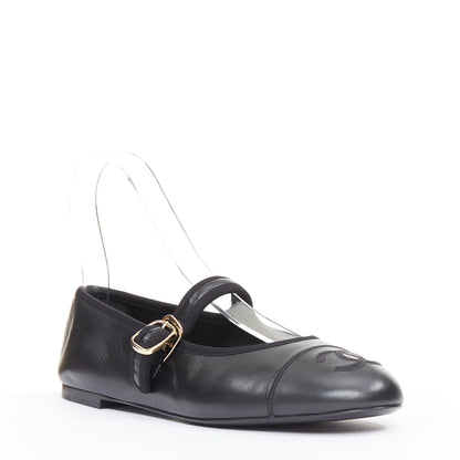 Women's Chanel black soft lambskin stitched CC cap toe flats