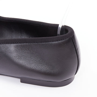 Women's Chanel black soft lambskin stitched CC cap toe flats