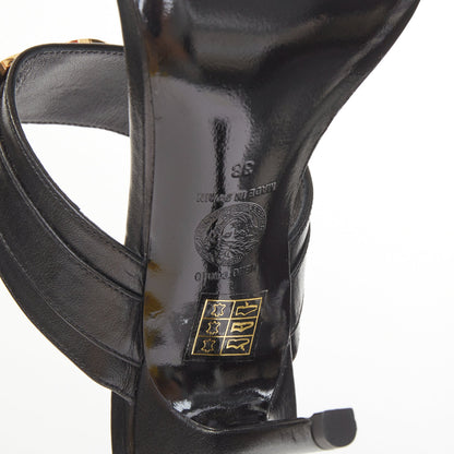 Women's Versace gold buckle black leather sandals