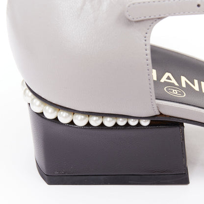 Women's Chanel grey leather pearl trimmed CC logo block heel pumps
