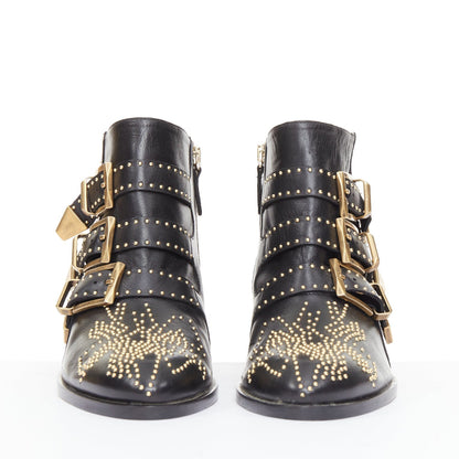 Women's Chloe Susanna black leather gold floral studded triple buckle boots