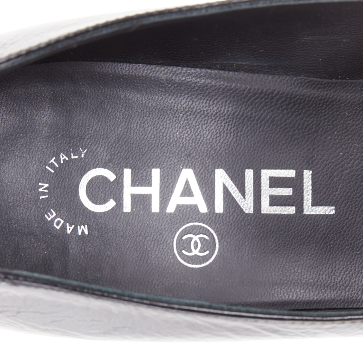 Women's Chanel Sculpted Sailor Knot black leather CC cap toe pumps