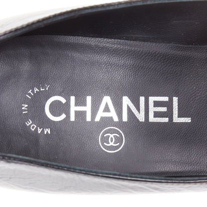 Women's Chanel Sculpted Sailor Knot black leather CC cap toe pumps