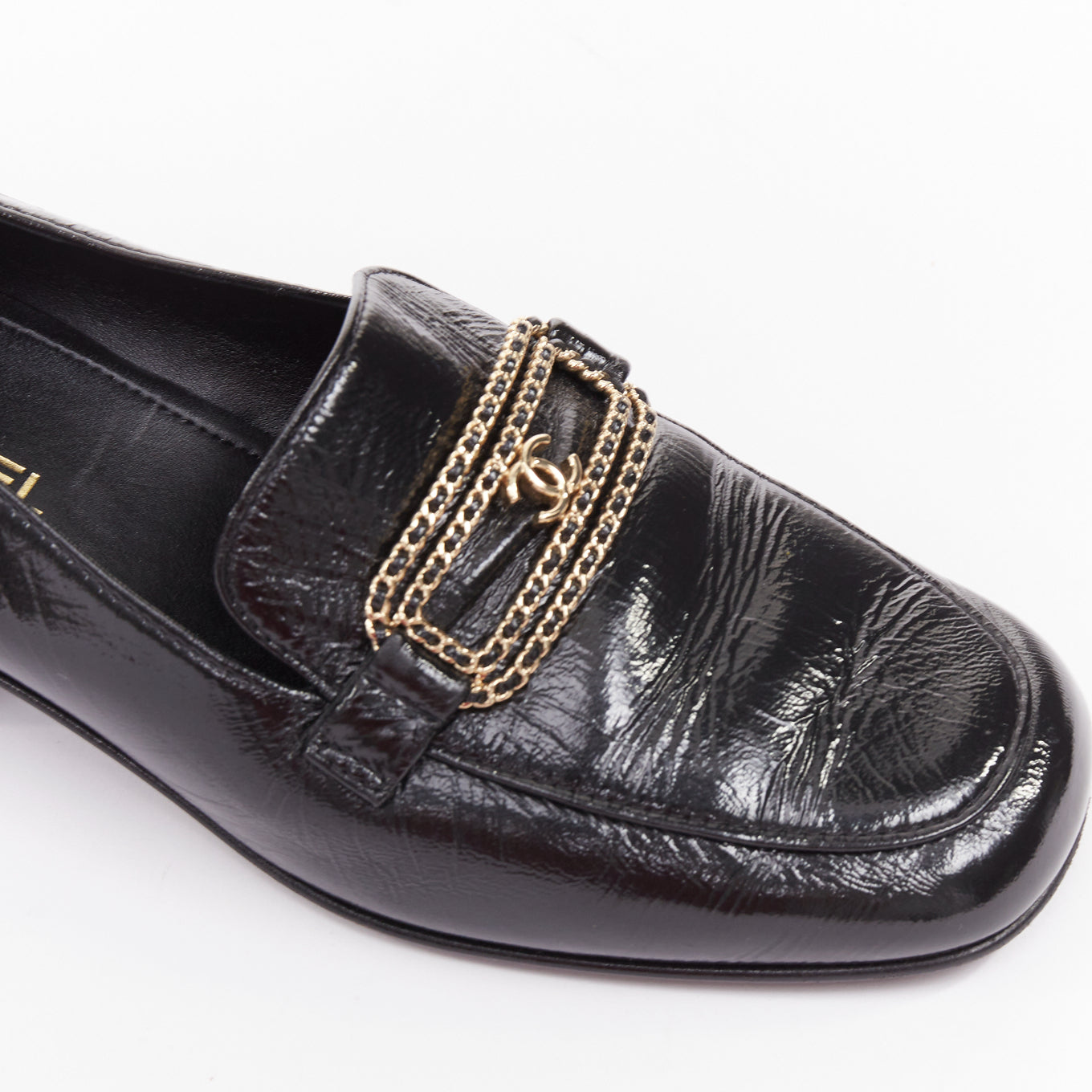 Women's Chanel black textured calfskin gold CC chain link moccasin