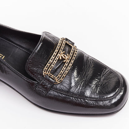 Women's Chanel black textured calfskin gold CC chain link moccasin