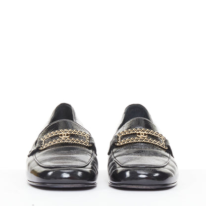 Women's Chanel black textured calfskin gold CC chain link moccasin