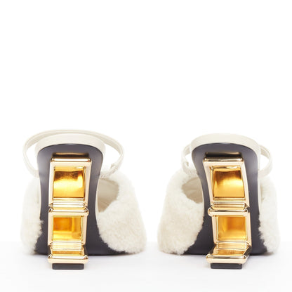 Women's Fendi First cream shearling gold F heel mule sandals