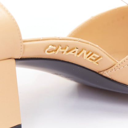 Women's Chanel nude quilted lambskin CC grosgrain cap toe pumps