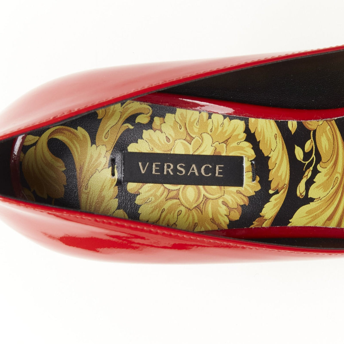 Women's Versace red patent Medusa stud pumps