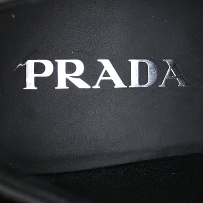 Women's Prada Triangle Logo Loafers in Black Patent Leather