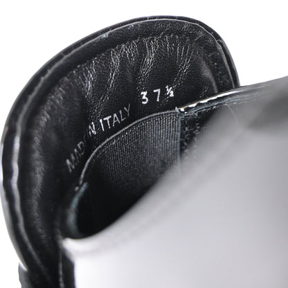 Women's Prada Triangle Logo Loafers in Black Patent Leather