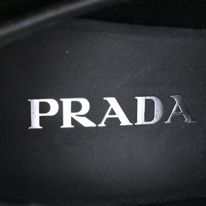 Women's Prada Triangle Logo Loafers in Black Patent Leather