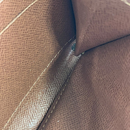 Zippy Wallet Monogram Canvas