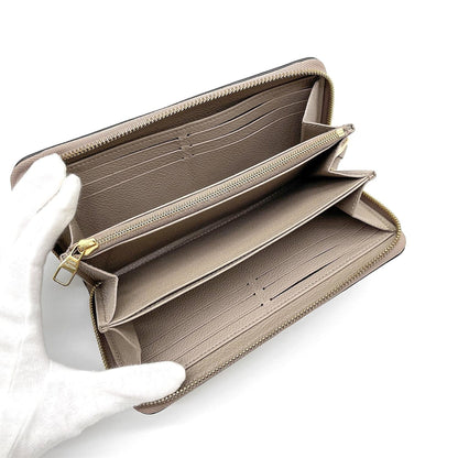 Zippy Wallet Bicolor Monogram Empreinte Giant