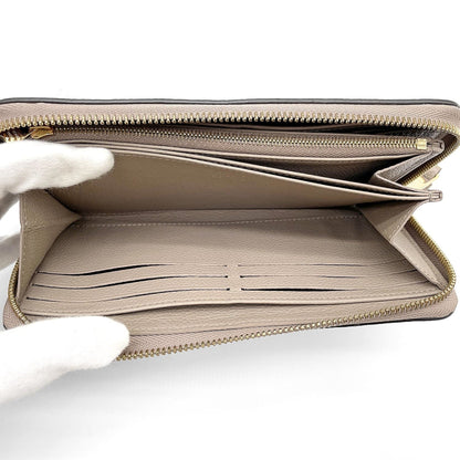 Zippy Wallet Bicolor Monogram Empreinte Giant