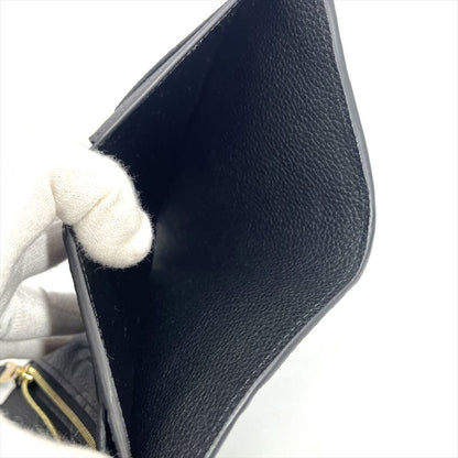 Curieuse Wallet Monogram Empreinte Leather