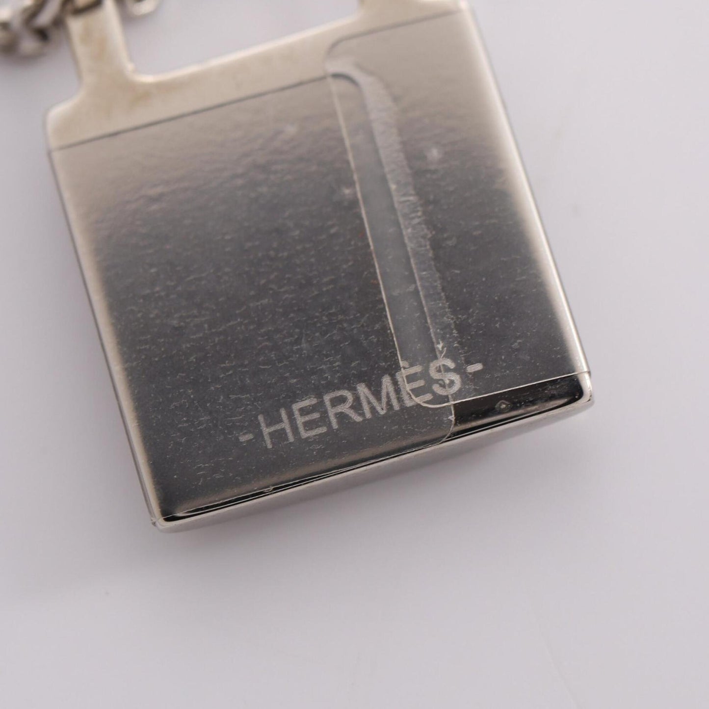 Kelly Pendant Necklace Metal and Swift Leather